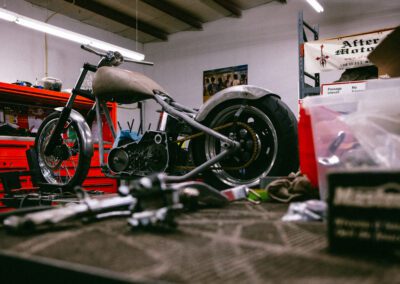 motorcyle being repaired in garage